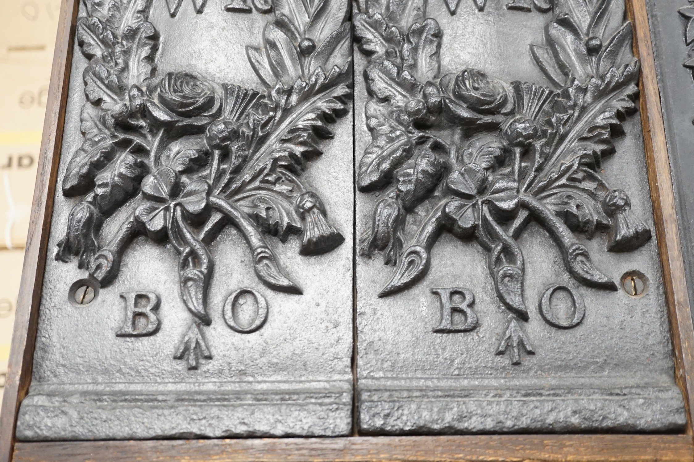 A pair of William IV Board of Ordinance cast iron framed plaques and a smaller plaque, each 54cms high x 17cms wide